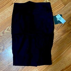 Black pencil skirt just above knee